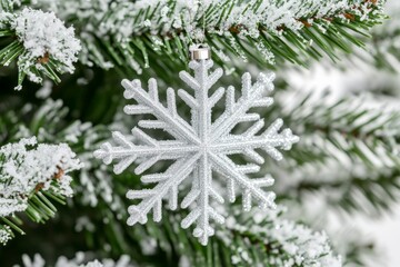 Close up of frosty snowflake ornament nestled on a snow covered evergreen branch highlighting its intricate patterns and glittery details against a lush green background