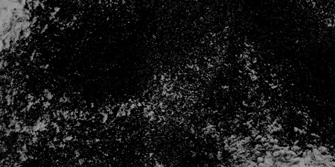 Abstract dark black texture of a grunge concrete wall with cracks and scratches background. The time-aged textured rough surface of the wall is black and gray . Texture or background. 