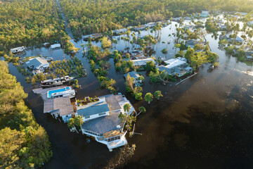 Flooded houses by hurricane rainfall in Florida residential area. Consequences of natural disaster
