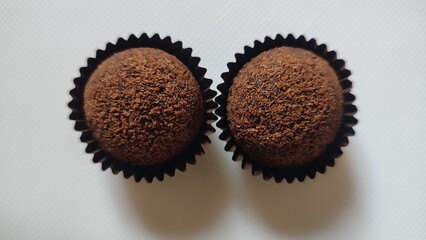 chocolate candies on white background