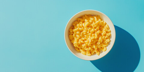 a whole view of mac and cheese on minimal background, view from above, editorial photography 