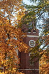 The facade of the Arsenal Museum building in Alexander Park, Pushkin, Russia, surrounded by trees...