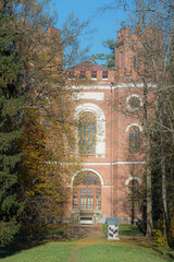 The facade of the Arsenal Museum in Alexander Park, Pushkin, Russia, showcases its beautiful red...