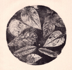 Fototapeta premium imprints of real leaves on paper, creative abstract grunge background