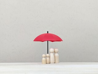 wooden doll family under the red umbrella. concept of insurance coverage, family protection.