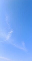 Clear blue sky with clouds