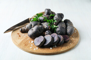 Concept of unusual vegetable - purple potato vegetable