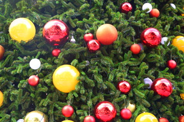 Close up decorated Christmas tree by colorful bauble ball, light can use for background