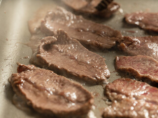 Grilling steak on a griddle