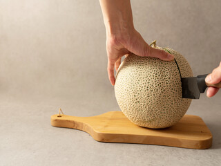 Fresh melon on a cutting board
