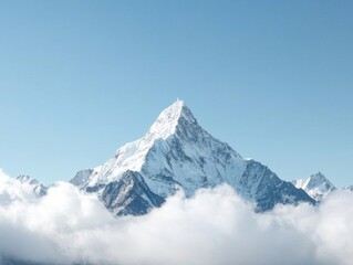 Majestic snow-covered mountain peaks above the clouds