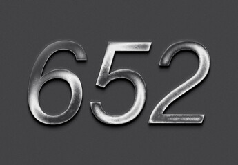 Chrome metal 3D number design of 652 on grey background.