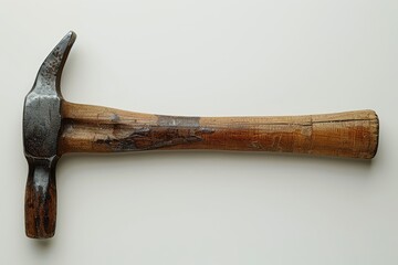 Vintage Claw Hammer Close Up: A classic, well-worn claw hammer with a wooden handle, isolated against a clean backdrop.  The hammer's weathered finish and worn wood speak to years of dedicated use.