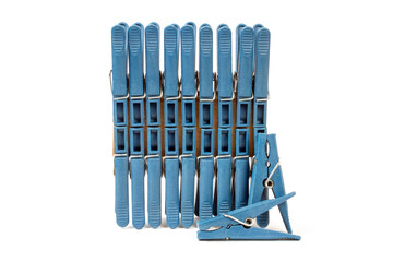 A set of blue plastic clothespins for clothes. Clothespins on a white background.