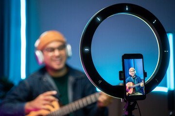 Professional Musician with condenser microphone and tablet for Mixing Mastering music. Music...