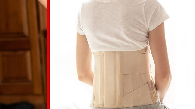 Woman with corset on back for back support from back and spine pain and girl holding her back from pain