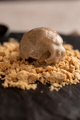 A ball of peanut halva-flavored ice cream