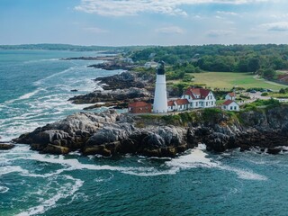 Portland Head Light and rocky coastline, Cape Elizabeth, Portalnd, Maine, United States.