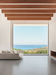 Modern interior with large window showcasing a stunning ocean view in bright daylight