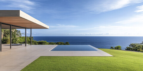 Serene modern villa with infinity pool overlooking the ocean in a tropical landscape during daytime