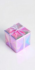 Obraz premium Small iridescent gift box with a pink ribbon on a white background