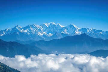 Fototapeta premium A stunning mountain range with peaks piercing through a blanket of clouds, capturing the majesty and grandeur of the landscape under a crisp, clear blue sky, creating a breathtaking vista.