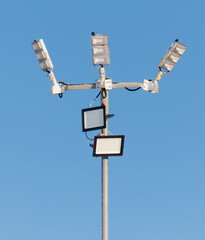 Fototapeta premium A tall pole with three lights on it