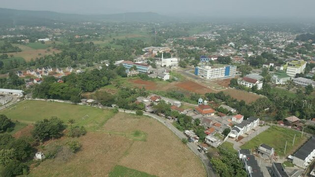Rural Bogor Neighborhood In Indonesia Drone Tracking Forward Over Fields 4K 60FPS