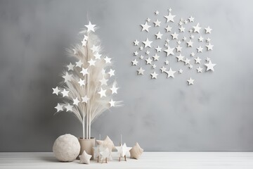 A minimalist white Christmas decoration featuring a starry tree and wall display in a serene space