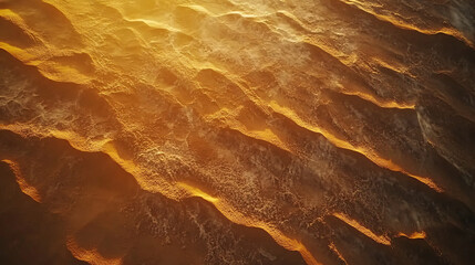 Obraz premium golden desert sand dunes aerial view at sunset