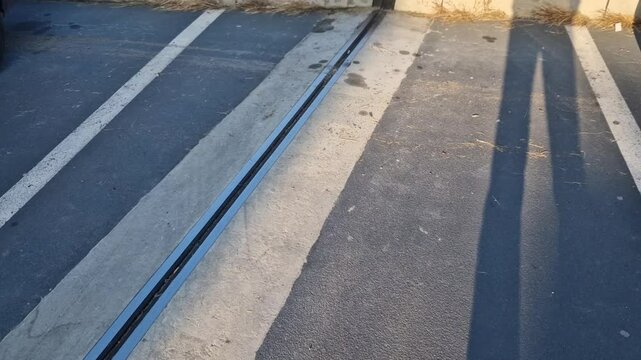 roof structure or bridge expansion for safe connection of two expandable concrete bodies. rubber joint in a metal bar, cracked, eroded, video, curb, renovation frost, salt, crack, crushed