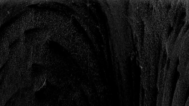 Black Textured With Horror Animation 4K.Abstract Black Sand Texture Scary HD Footage
