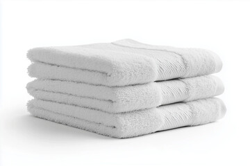Folded stack of white towels isolated on white background.