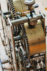 Oxidized gears reveal craftsmanship in antique timepieces