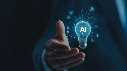 A businessman holding a light bulb with holographic text AI and chat bubbles on a virtual screen.