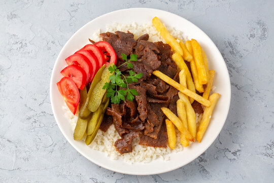 Meat doner menu, iskender menu on plate, turkish special meat doner, food, special menu (Turkish name; pilav &uuml;st&uuml; et doner)