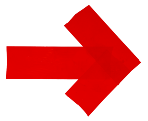 Isolated red arrow made from tape on white