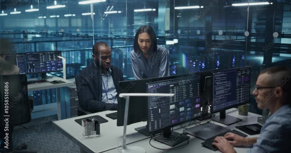 Aufkleber Diverse Team of Developers Working on Computers in a Modern Office in a Data Center Facility. Team Analyzing Data and Optimizing Systems. Asian Manager Having a Conversation with a Colleague