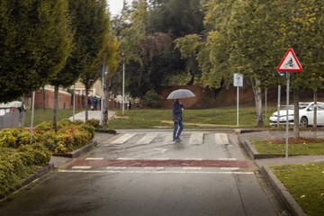 pedestrian crossing the street