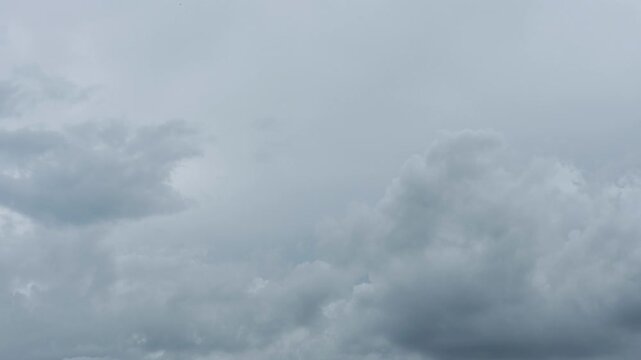 The sky and clouds move with the currents of wind, rapidly changing weather conditions, wind and storms.