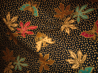 batik motif or pattern with flowers is a traditional Indonesian design pattern with flowers