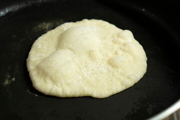 Wheaten Pita Flat Bread. Baking Bread. Raw pita. Food concept