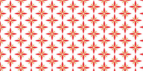 Unique pattern with red and orange floral motifs with the addition of small green circles on a white background