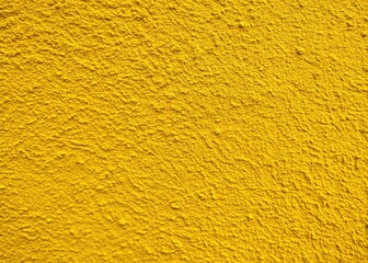 Naklejka premium Bright yellow cement wall texture ideal for diverse backgrounds and design projects. Perfect for both digital and paper uses, this texture adds a creative touch.