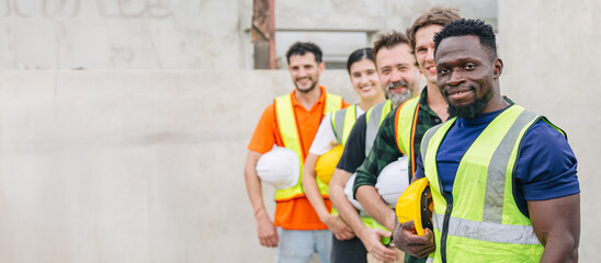 Workers teamwork in construction industrial plant. Diverse workers standing together happy smiling wide for banner with space for text.