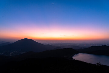 City mountain sunset