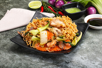 Asian cuisine - Fried noodles with seafood