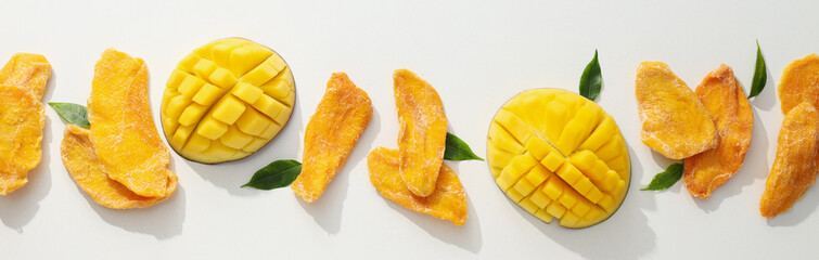 Dried mango chips with fresh sliced mango