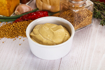 Dijon mustard sauce in the bowl