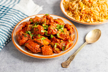Spicy, tangy, and savory, chili chicken features crispy fried chicken tossed in a bold sauce with...